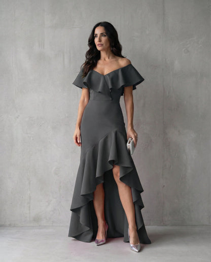 Abril · Vestido elegante con volantes y escote en V